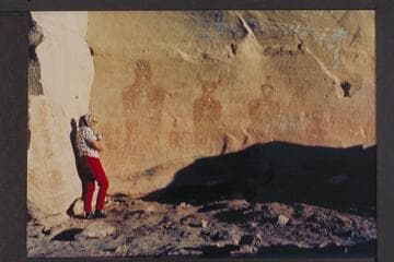 Paintings 3 miles north of Thompson, Utah. Hazel Ekker at right