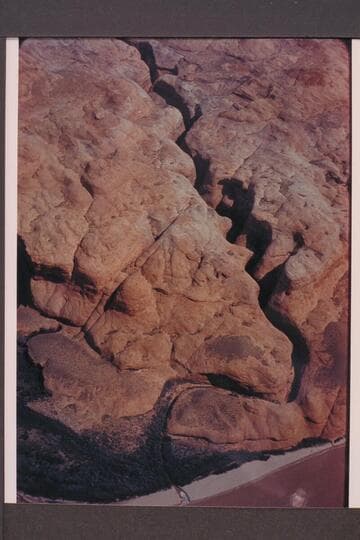 Tributary to Glen Canyon at Mile 63.9; right bank.  Approximate gauge:  31,000 cfs