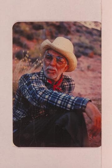 Arch-eyes Masland refuses to be convinced that he was cruel when he turned out the horses from his bed the night before. Navajo Canyon