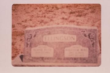Ellingson headstone in Elgin Cemetery. Probably Malcolm B. Ellingson is buried there. He is known on the River as Moki-Mac. (out of focus)