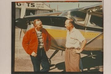 Bill Belknap and George Crockett with Cessna plane used for flight over the canyon