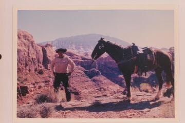 Dan Lehi at the mouth of Nasja Creek. The fork of Bald Rock and Nasja Creeks is behind the horse