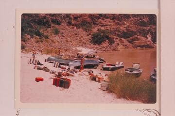 The two prop boats for the Disney Powell picture on the beach for repairs to the glass. The camera boat in back of them and the work boat at their sterns. Two of the three Smith-Craft at right