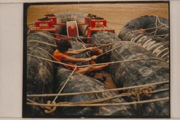 Patching the large inflated units operated by Georgie White