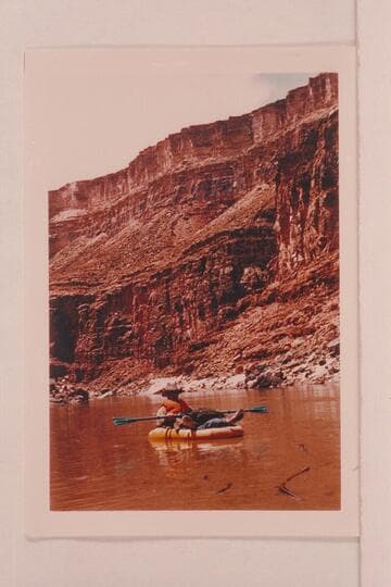 Frank Moltzen floating in his inflated boat in Marble Canyon