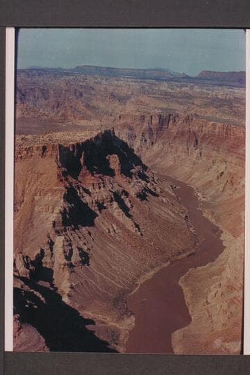 Downstream in Cataract Canyon from Mile 209.8 to Mile 211. Preliminary gauge: 29,700 cfs
