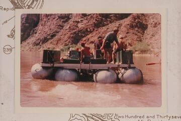 The "Canyoneers" rig seen from the stern.  Mile 236.  The driver stands at a low point at the stern so runs blind in rapids