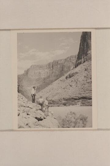 Crew of the "Esmeralda II" at mouth of Little Colorado.  Ed Hudson is let mugging the camera, Edward Hudson and Bestor Robinson