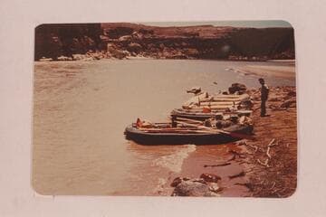 Lees Ferry, Colorado River. Final photo on beach. Equipment of the Cave Men used in run from Lees Ferry to Bright Angel Creek