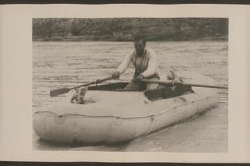 Amos Burg in "Charlie." Green River, Wyoming. Raining
