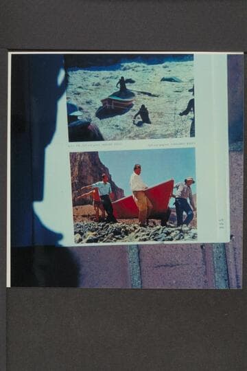 Lining and portage at Vulcan Rap8id. Lining by Clyde Thomas (Martin Litton). Portage by Clyde Childress