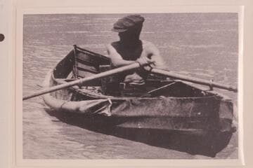 Frank Dodge in the folding canvas boat "Mojave" as the USGS 1923 party left Lees Ferry.  The boat was wrecked while lining Cave Springs Rapid