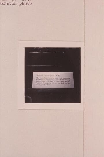 Sign on the Galloway-Stone boat which was used by Julius F. Stone in his River trip of 1909 from Green River, Wyoming, to Needles. The boat was on exhibit at the opening of the Visitors Center at Grand Canyon at the time of the official opening