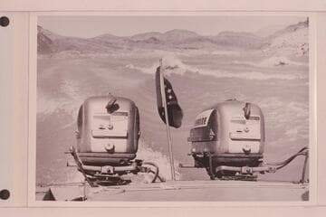The stern of the "BOOTOO" and the wakes of the three boats
