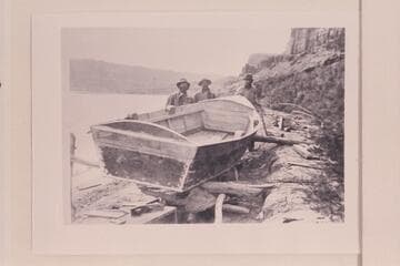 John Ginty; George Uden; Timothy O'Keefe. Working on "Nancy Lee" at mouth of Crescent Creek. The "Nancy Lee" was used as one of the two boats to traverse Glen Canyon in 1897-1898 as a reconnaissance survey