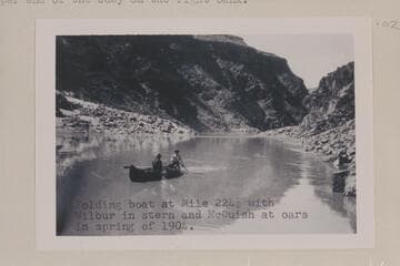 Ellsworth Kolb's first boating experience. He is posed at the oars of one of Dave Rust's folding canvas boats near Bright Angel Creek while the young lady tries to look calm and collected