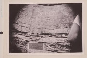 Plaque and marking at Willie's grave. Mile 44 in Marble Canyon
