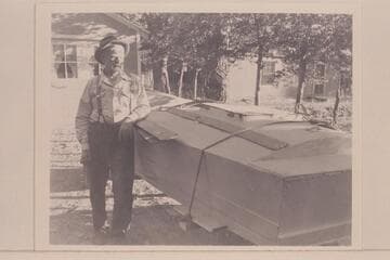 The 79-year-old Bert Loper stands by his boat at his home in Greenriver, Utah, the night before leaving on his fatal trip into the Grand Canyon.  He died at Mile 24 1/2 in Marble Canyon on July 8