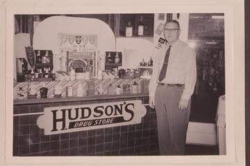 Ed Hudson in front of his drug store in Paso Robles, California