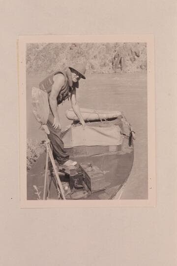 "Ed" Hudson on his motorboat "Esmeralda"