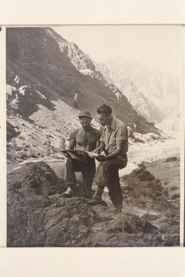 Norm Nevills and Jack Rottier; Eagle Bar Peak in background. Snake River, Idaho