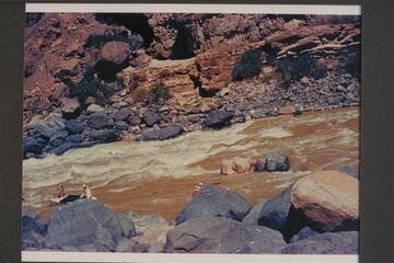 Mexican Hat Expedition lining Vulcan Rapid.  Approximate gauge:  7,800 cfs