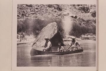 Bishop W. R. McConkie and Wayne McConkie taking Doris Nevills for a ride in their canoe at the head of Cataract Canyon