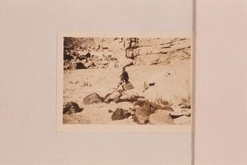 Glenn Hyde posed on rock fan at left at 27 Mile Rapid