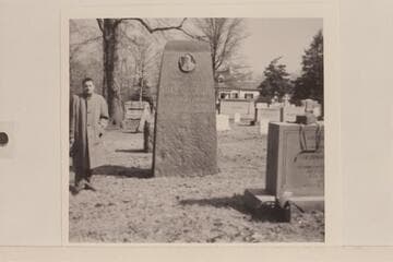 Robert W. Olsen, Jr., at the grave of John Wesley Powell in Arlington Cemetery.  In 1969 Olsen was Historian for the National Park Service at Whitman Mission National Historic Site, Walla Walla, Washington
