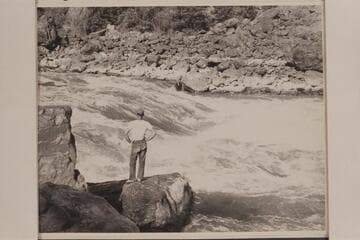 Norm Nevills studies Buck Creek Rapid