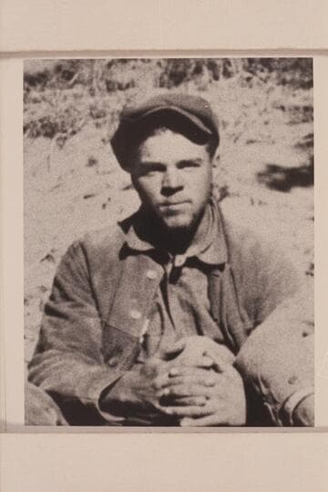 Leigh Lint.  On the day this photo was made, Lint recorded the finding of the Gregory Bridge, giving its dimensions.  Members of the crew of the USGS party surveyed Cataract Canyon in 1921, Sep.  This photo of Lint is taken from a group picture