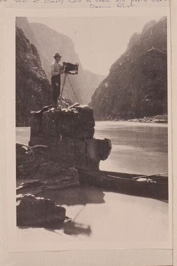 Emery Kolb photographing in the Grand Canyon near Bright Angel Creek.  One of Dave Rust's folding canvas boats is at right