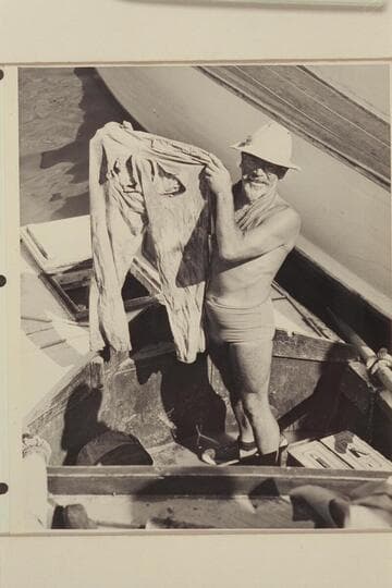 Marston holding pants recovered from cache below Point Sublime. End of Nevills trip