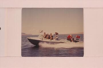 Buzz Belknap piloting the "Cactus" on Lake Mead. Buzz at the wheel, Jeffrey Marston, Jim Jordan, Elsie I'Anson and Ed I'Anson