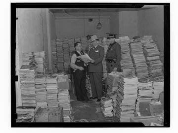 Los Angeles County Sheriff Eugene W. Biscailuz with banned magazines