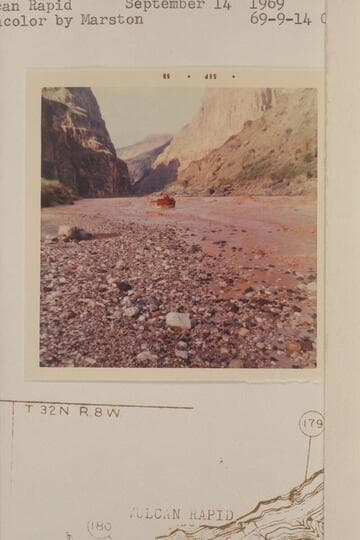 Deck boat running up the eddy at the left bank of Vulcan Rapid