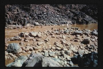234 Mile Rapids from mouth of side canyon; Mile 233.7, Bill Belknap at edge of river