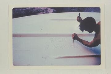 Cutting name on "Rich" boat, Cataract Canyon. About Mile 189 3/4