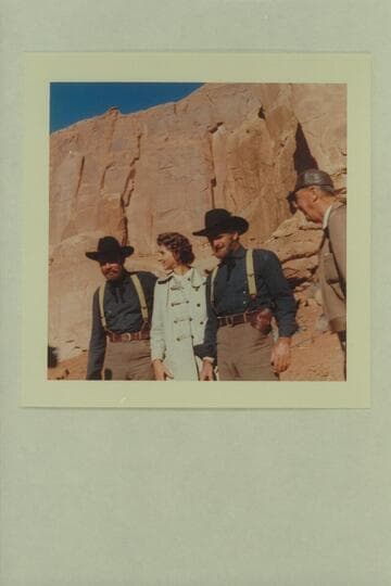 John Beal as Major Powell; a waitress for Stan Peck of Arches Cafe; Dave Sharp, stunt man for Major Powell; Bill Beaudine, director. Disney filming of "The Colorado River Story" at Moab