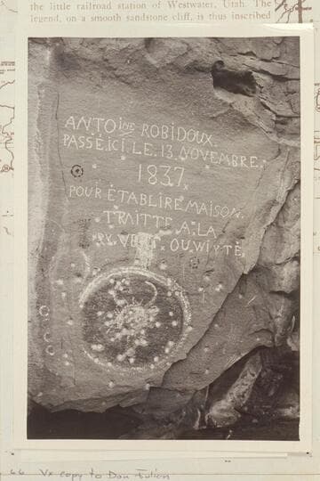 Robidoux inscription. About 30 road miles northeast of Cisco, Utah. On the west wll of a shallow canyon called East Canyon which drains the Book Cliffs