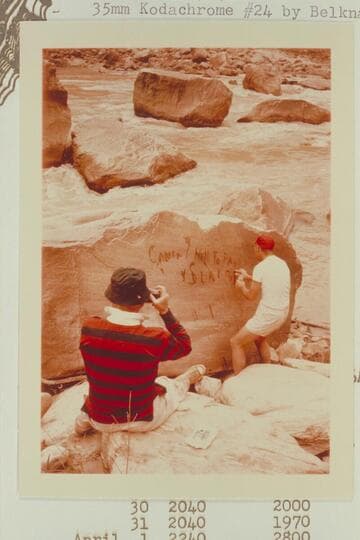 Dock Marston photographs Jorgen Visbak at the Best Expedition inscription at Rapid 16 in Cataract Canyon. Best Wreck Rapid