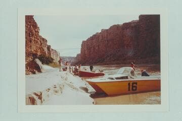 Bailing "Big Red" after holing at Mile 3 1/2 in Marble Canyon