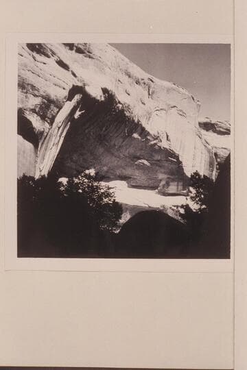 Large cave in upper Surprise Valley. A few small ruins are in this cave and it has an inscription on one of the boulders: M.A.SMITH/O.B.LUNDAHL/7/16/08