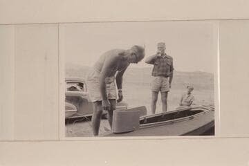 F. E. Masland and Joe Eisaman assemble foldboat at Mexican Hat