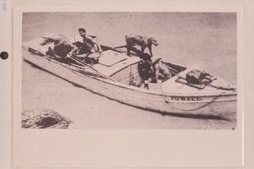 The "Powell" at the start-off, showing our mascot "Rags." The boat of the Eddy fleet which was lost in Dubendorff Rapid. This was one of the heavy boats copied after the archaic designs of Powell