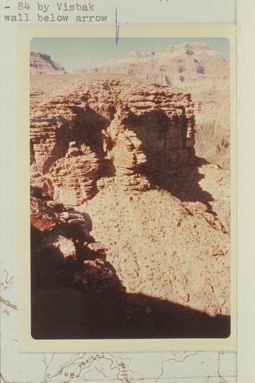 Tapeats wall on west side of small canyon west of Horn Creek Canyon. Visbak climbed the wall below arrow
