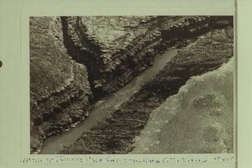Mouth of Tanner Wash; Sheerwall Rapid. Approximate gauge: 5,700 cfs
