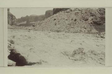 The "Marble" in Badger Creek Rapid. Emery Kolb, boatman