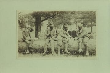 The Zahn party stopping for lunch at the pass over the arm of the San Francisco Mountains. They took their Franklin car from Los Angeles to the Zahn Mine on the San Juan River in 1915, Sep