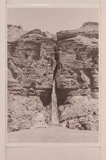 Deer Creek Falls. The clear water of the lagoon is held by a low sand bar